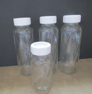 Lot of 3 Evenflo 8 Oz Size w/ 1- 4 oz. Clear Glass Baby Bottles With White Lids - Picture 1 of 5