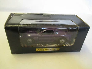 Aston Martin DB 7 Mauve Shell Modèle pourvu d'un mécanisme à rétrofriction 1/40 - Picture 1 of 2