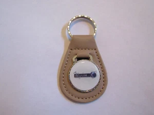 1965 1966 1967 AMERICAN MOTORS AMC MARLIN VINTAGE LOGO KEYCHAIN KEYRING BEIGE - Picture 1 of 2