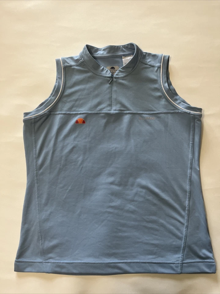 Top deportivo Ellesse para mujer talla 12 azul sin mangas 1/4 cremallera frontal logotipo Foto 1 de 4