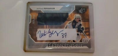 03-04 Upper deck SPX Patrice Bergeron Rookie Stars Patch Auto #854/925 - Image 1 of 2
