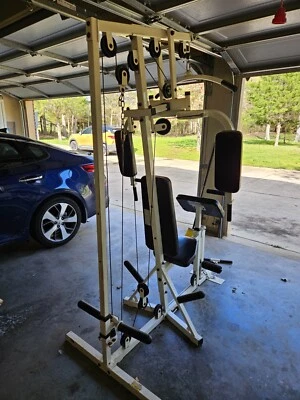 Equipo de gimnasio universal usado con 175 lb de pesas Foto 1 de 2