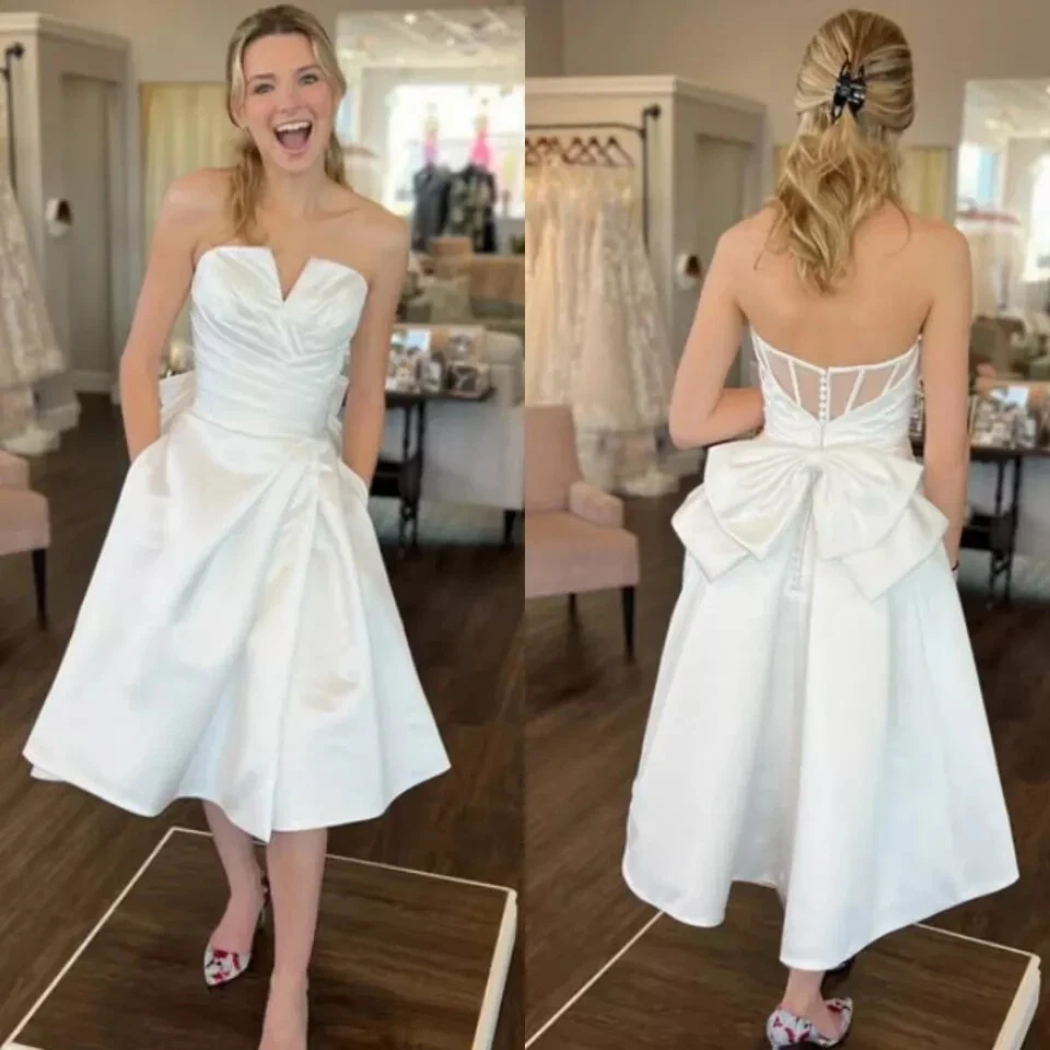 Vestidos de novia cortos con lazo satinado playa fuera del hombro boho mini vestidos de novia Foto 1 de 4