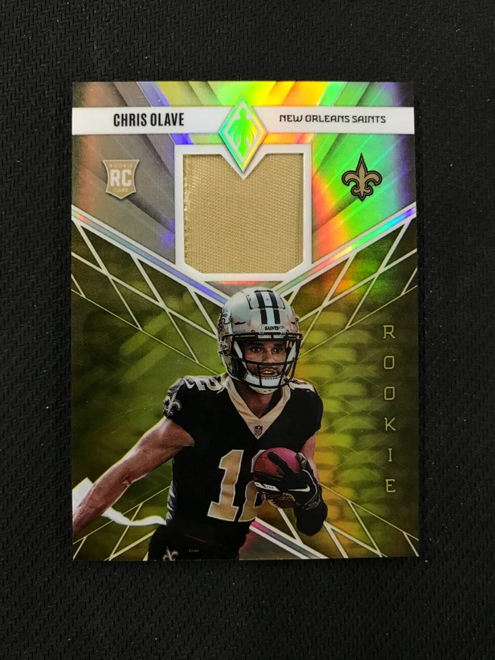 2022 Panini Phoenix RME-9 Chris Olave Rookie Memorabilia Patch Yellow /50 Saints - Image 1 of 2