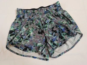 "Corto de tiro medio Lululemon Tracker 4"" floreciente rápido talla 6 para correr" - Imagen 1 de 4