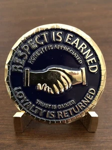 MONEDA DESAFÍO MOTO "SE GANA RESPETO" "SE DEVUELVE LEALTAD" - Imagen 1 de 2