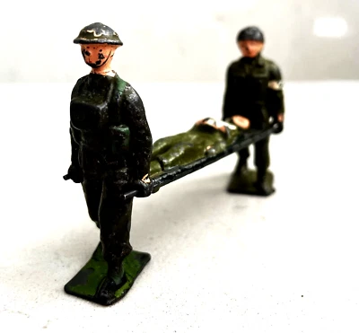 Cherilea 2 soldados de juguete llevando soldado herido en camilla/campeona Inglaterra Foto 1 de 4