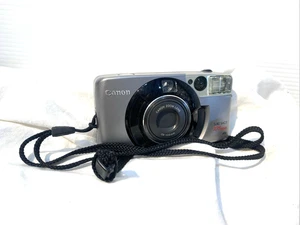 Canon Sure Shot 105 Zoom 35 mm fotocamera punta e scatta pellicola non testata argento nero - Foto 1 di 11
