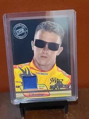 Insert AJ Allmendinger Press Pass Ignite 2012 Card #IM-AJ Race-Used Firesuit - Image 1 of 2