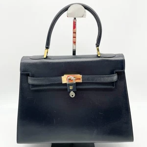 Auténtico bolso de mano BALLY con asa superior clásico de cuero Turnlock negro herrajes dorados - Imagen 1 de 24