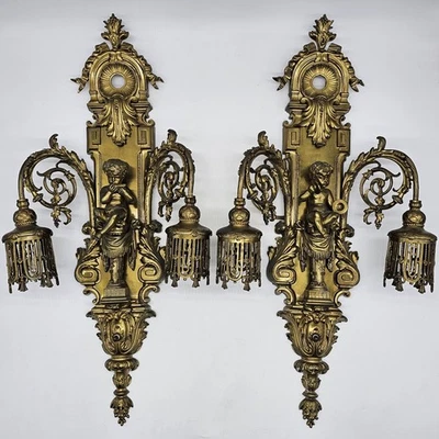 Par de apliques de pared antiguos rococó de bronce dorado figuras putti iluminación ornamentada de 25,5" Foto 1 de 4