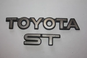1990 1991 1992 1993 TOYOTA CELICA ST REAR TRUNK DECK LID HATCH EMBLEM SET PAIR - Picture 1 of 1