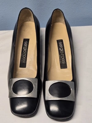 Tacones bajos Sergio Rossi negros con hebilla adornada plateada talla 35 EE. UU. 5 Foto 1 de 4