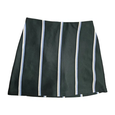 Falda corta Tory Burch rendimiento deportivo golf tenis rayas verdes as  Foto 1 de 4