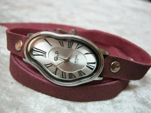 Reloj de fusión Salvador Dalí reloj ondulado fluido reloj suave dorado plateado - Imagen 1 de 12