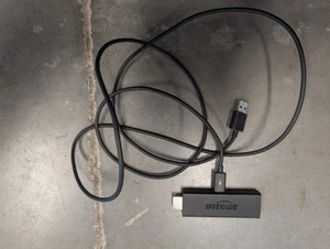 Amazon Fire TV HD Streaming Stick (W87CUN) and Power Supply - Picture 1 of 6