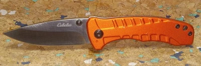 BEAUTIFUL BURNT ORANGE CABELA'S CLIP-ON POCKET KNIFE W/ FISH BONE DESIGN HANDLE  - Image 1 of 4