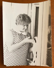 Beautiful Girl with a Cat by the Window Vintage photo