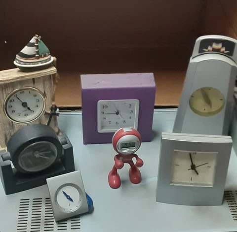 CLOCK COLLECTION. UNUSUAL DESIGNS. GOOD CONDITION.  MOVEMENT Cover