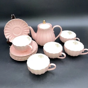 Set da tè in porcellana rosa collezione Royal, servizio per 5 TAZZE/PIATTINI e TEIERA - Foto 1 di 8