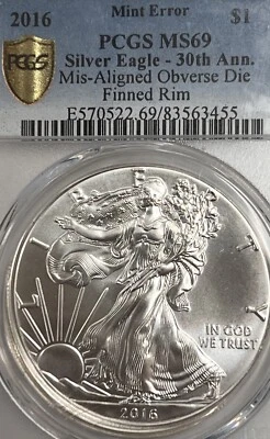 2016 SILVER EAGLE MIS ALIGNED OBVERSE DIE FINNED CAP-LIKE HIGH RIM ERROR PCGS-69 - Image 1 of 4
