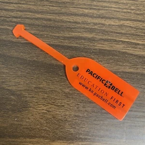 VTG Orange Pacific Bell Education First Ad Rubber Safety Luggage Key Tag - Picture 1 of 3