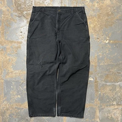 Pantalones de peto de lona negros forrados de franela Carhartt vintage para hombre talla 40x30 Foto 1 de 4
