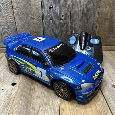 2000 Tyco 2006 Subaru Impreza WRX RC Car #7 WRC Blue WORKING SEE VIDEO - Image 1 of 4