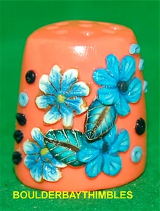 BOULDER BAY THIMBLE - FLORAL  #SB6 BLUE FLOWERS on NEON TANGERINE CLAY - Picture 1 of 3