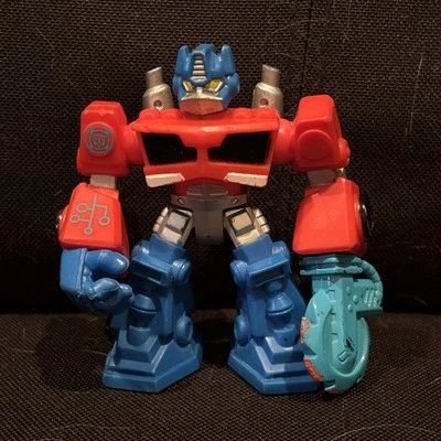 Playskool Rescue Bots Optimus Prime 3.5" Figure Teal Energize Saw Arm - Image 1 of 4