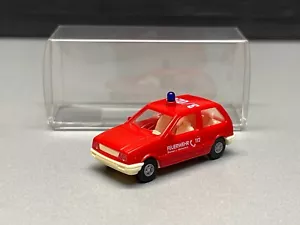 Suzuki Swift Feuerwehr FW Strahlen und Atemschutz 112 PKW rot RM Rietze H0 1:87 - Bild 1 von 12
