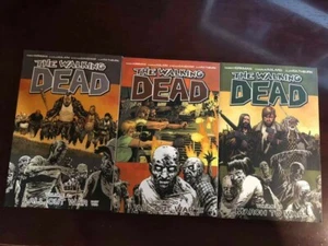 The Walking Dead -Graphic Novels-March to War Vol. 19 + All Out War Vol. 20 + 21 - Picture 1 of 1