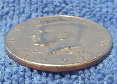 1997 D Kennedy Half Dollar Missing Reeded Edge.  - Image 1 of 4