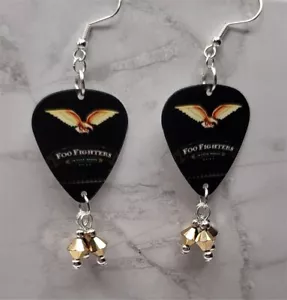 Orecchini Foo Fighters In Your Honor Guitar Pick con pendenti Swarovski oro - Foto 1 di 4
