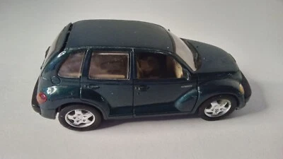 Saico Chrysler PT Cruiser Diecast Car 1/34 Scale Pull Back Friction Doors Open - Image 1 of 4