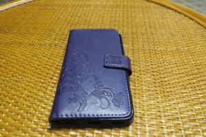 Leather Magnet Case Purple phone size 6 1/4 X 31/4 this is the inside of case