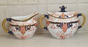 JUEGO DE HELECHO ROYAL CROWN DERBY IMARI #2712 CREMA Y AZÚCAR 1911-14 ADORNO DORADO EXCELENTE - Imagen 1 de 8