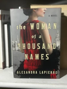 The Woman of a Thousand Names by Alexandra Lapierre - HC/DJ/VG - Imagen 1 de 6