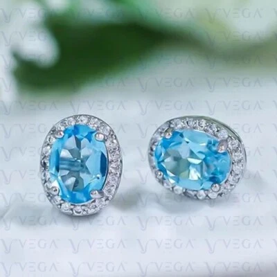 Par de pendientes de topacio natural y diamantes de corte ovalado de 4,50 quilates enchapados en oro blanco de 18 k Foto 1 de 4