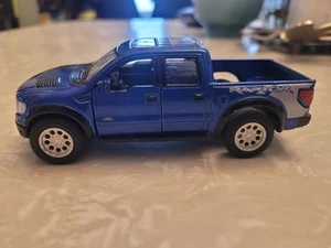 Kinsmart 2013 Ford F150 SVT Raptor Super Crew Pickup Truck, Blue, 1/46 - Picture 1 of 11