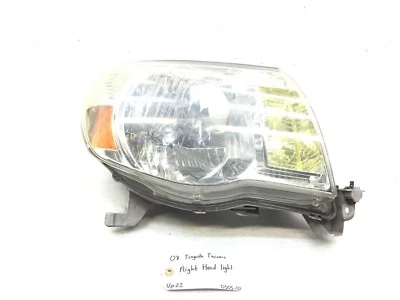 Faro derecho pasajero Toyota Tacoma 2005-2011 OEM Foto 1 de 4