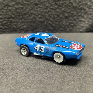Auto World Petty Road Runner 43 STP réplica personalizada ranura Ho funciona bien casi como nuevo - Imagen 1 de 8