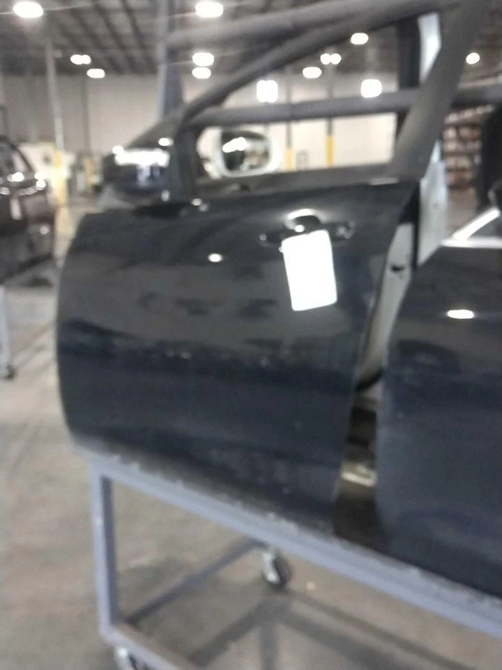 Mazda 2014 5 puertas izquierdas negro usado pieza OEM con abolladura, 129 k millas Foto 1 de 3