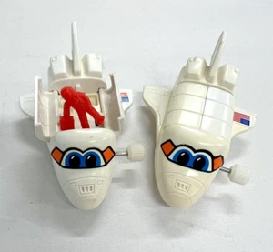 2 TOMY Wind Up Toy Space Shuttles with Orange Astronaut Doors Open/Close Works - Picture 1 of 7