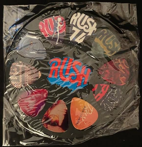 Juego de 10 púas de guitarra imán nevera RUSH nunca abiertas sin usar 2112 Starman - Imagen 1 de 1