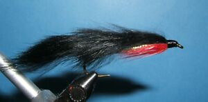 Zonker – black  – red gills – silver body  12 streamers.