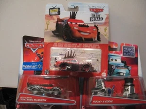 MATTEL PIXAR CARS 1:64 2014 HEAVY METAL MCQUEEEN/ROCKY+EDDIE Y 2021 RUMBLER MCQ - Imagen 1 de 3