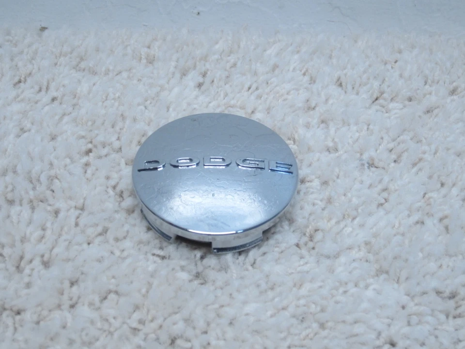 DODGE AVENGER, CALIBRE, CHALLENGE, CARGADOR TAPA CENTRAL CROMADA 1SK35TRMAA #2D-5 Foto 1 de 2