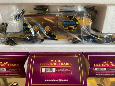 MTH PREMIER  CATERPILLAR #20-98425 47' TTX HD FLAT CAR #131012 W/725 ARTIC TRUCK - Image 1 of 3