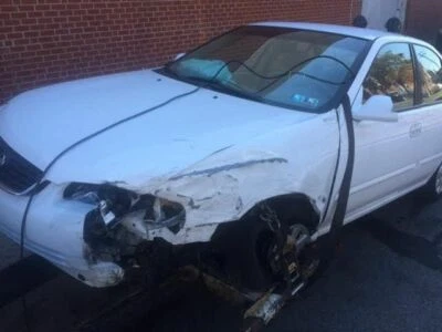 01 NISSAN SENTRA R. LOWER CONTROL ARM FR SE 15 WHEEL FROM 12/00 132774 - Image 1 of 4